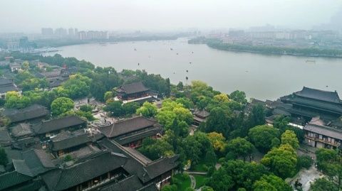 旅行無錫太湖之行，泛舟湖上，看落日余暉下的江南風(fēng)光
